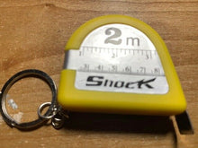 Load image into Gallery viewer, Shock Tape Measure - Jokes, Gags and Pranks - This Tape Measurer Is Shocking!