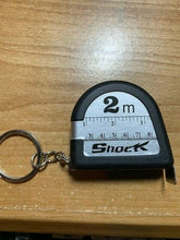 Load image into Gallery viewer, Shock Tape Measure - Jokes, Gags and Pranks - This Tape Measurer Is Shocking!