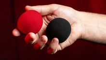 Load image into Gallery viewer, Magic Color Changing Sponge Balls 2&quot; - Includes One Red and One Black!
