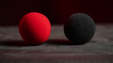 Load image into Gallery viewer, Magic Color Changing Sponge Balls 2&quot; - Includes One Red and One Black!
